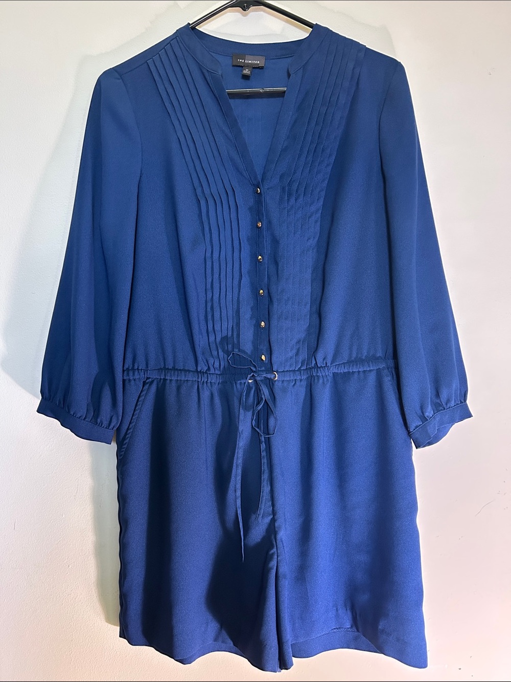 The Limited Dark Blue Pintuck Drawstring Mini Dress Jumper with side pockets.